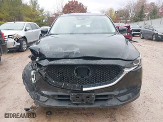 2017 Mazda CX-5 Sport with VIN JM3KFBBL5H0201857, listed as a IAAI auction lot 40885161 with 87,464 mi miles. Bid and sale history available at carsss.com. Image 12.