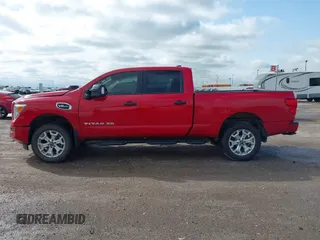 2023 Nissan Titan Pro-4X with VIN 1N6AA1FB9PN104089, listed as a IAAI auction lot 42202488 with 58,151 mi miles and . Bid and sale history available at DreamBid. Image 14.