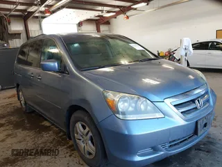 2007 Honda Odyssey EX-L z VIN 5FNRL38617B078923, wystawiony jako IAAI lot #42335122 z przebiegiem 154 352 mil mil oraz . Historia ofert i sprzedaży dostępna na DreamBid. Obrazek 1.
