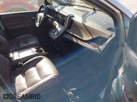 2015 Toyota Sienna XLE with VIN 5TDYK3DC0FS632909, listed as a IAAI auction lot 42012143 with 97,084 mi miles and . Bid and sale history available at DreamBid. Image 5.