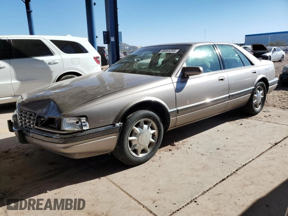 1997 Cadillac Seville Luxury SLS z VIN 1G6KS52Y5VU815770, wystawiony jako Copart lot #88555205 z przebiegiem 92 459 mil mil oraz Czysty tytuł • Clean title. Historia ofert i sprzedaży dostępna na DreamBid. Obrazek 1.