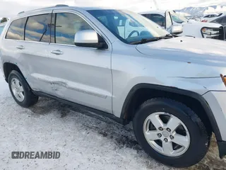 2011 Jeep Grand Cherokee Laredo with VIN 1J4RR4GG7BC584500, listed as a IAAI auction lot 41383355 with 161,722 mi miles. Bid and sale history available at carsss.com. Image 6.