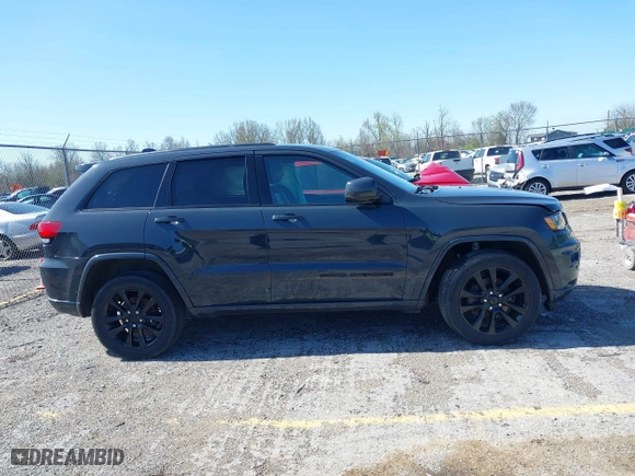 2018 Jeep Grand Cherokee Laredo E with VIN 1C4RJFAG2JC420927, listed as a IAAI auction lot 41962579 with 90,898 mi miles. Bid and sale history available at carsss.com. Image 14.