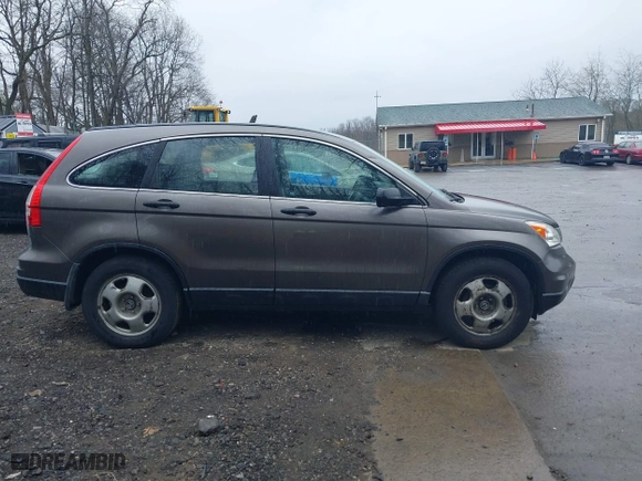2010 Honda CR-V LX with VIN 5J6RE4H30AL012299, listed as a IAAI auction lot 42052865 with 160,786 mi miles. Bid and sale history available at carsss.com. Image 13.