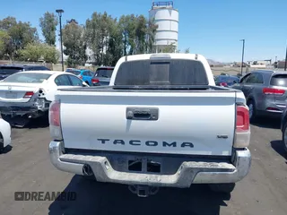 2023 Toyota Tacoma SR with VIN 3TMCZ5AN4PM558760, listed as a IAAI auction lot 42626514 with 39,335 mi miles and . Bid and sale history available at DreamBid. Image 16.