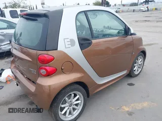 2015 Smart fortwo Passion with VIN WMEEJ9AA4FK831076, listed as a IAAI auction lot 42424797 with Not provided miles and . Bid and sale history available at DreamBid. Image 4.