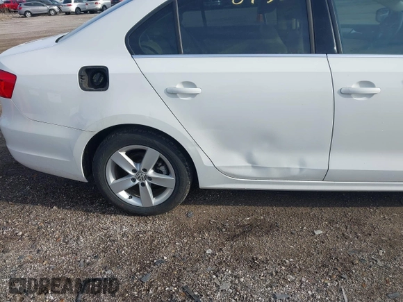 2013 Volkswagen Jetta TDI w/Premium with VIN 3VWLL7AJ6DM422102, listed as a IAAI auction lot 41956935 with 143,385 mi miles and . Bid and sale history available at DreamBid. Image 6.