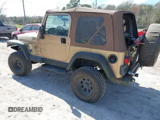 2000 Jeep Wrangler Sahara with VIN 1J4FA59S8YP763468, listed as a IAAI auction lot 41554183 with 182,922 mi miles. Bid and sale history available at carsss.com. Image 3.