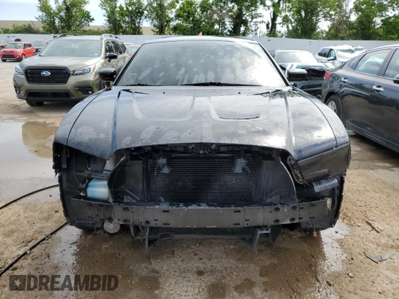 2013 Dodge Charger SXT z VIN 2C3CDXJG5DH730966, wystawiony jako Copart lot #56645314 z przebiegiem 198 160 mil mil oraz Szkoda całkowita • Salvage title. Historia ofert i sprzedaży dostępna na DreamBid. Obrazek 5.