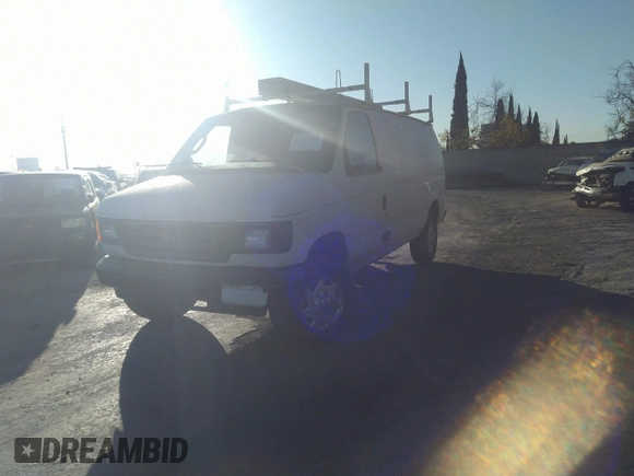 2004 Ford Econoline Cargo with VIN 1FTSE34L44HA80944, listed as a IAAI auction lot 41293998 with 187,737 mi miles and . Bid and sale history available at DreamBid. Image 2.