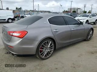 2016 Maserati Ghibli S Q4 z VIN ZAM57RTA6G1172334, wystawiony jako Copart lot #56601575 z przebiegiem 109 524 mil mil oraz Szkody całkowita. Historia ofert i sprzedaży dostępna na DreamBid. Obrazek 3.