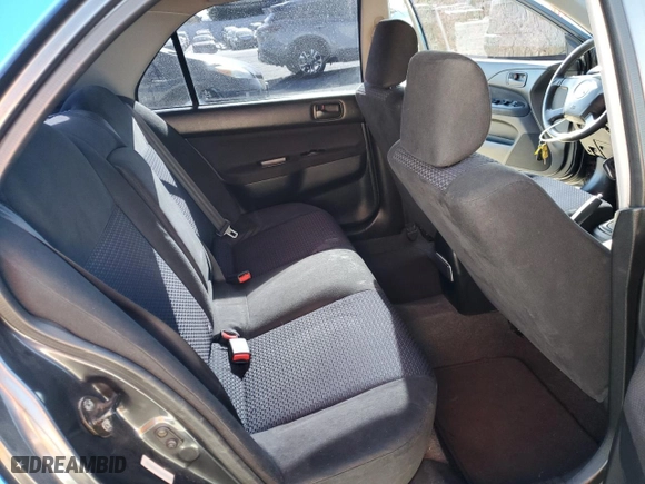 2002 Mitsubishi Lancer OZ-Rally with VIN JA3AJ86E62U070034, listed as a Copart auction lot 86914144 with 180,675 mi miles and Salvage Title. Bid and sale history available at carsss.com. Image 10.