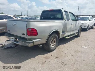 2002 Ford F-150 XL with VIN 2FTRX07242CA45481, listed as a IAAI auction lot 42097689 with 1 mi miles. Bid and sale history available at carsss.com. Image 4.