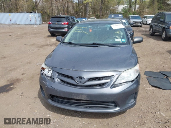2011 Toyota Corolla L with VIN 2T1BU4EE4BC542333, listed as a IAAI auction lot 42122502 with 100,331 mi miles. Bid and sale history available at carsss.com. Image 12.
