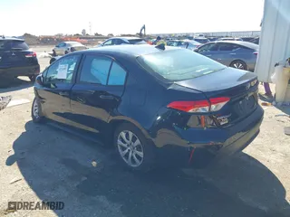 2023 Toyota Corolla LE with VIN 5YFB4MDE9PP076908, listed as a IAAI auction lot 41761902 with 9,049 mi miles. Bid and sale history available at carsss.com. Image 3.