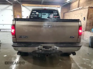 2002 Ford Super Duty F-250 XL with VIN 1FTNX21S82EC95447, listed as a Copart auction lot 44248925 with 127,623 mi miles and Salvage Title. Bid and sale history available at carsss.com. Image 6.
