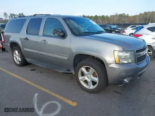 2009 Chevrolet Suburban LT w/2LT with VIN 1GNFC26029R218011, listed as a IAAI auction lot 41545480 with 223,616 mi miles. Bid and sale history available at carsss.com. Image 1.