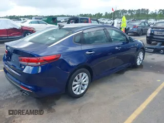 2018 Kia Optima LX with VIN 5XXGT4L32JG189009, listed as a IAAI auction lot 42010285 with 313,004 mi miles. Bid and sale history available at carsss.com. Image 4.