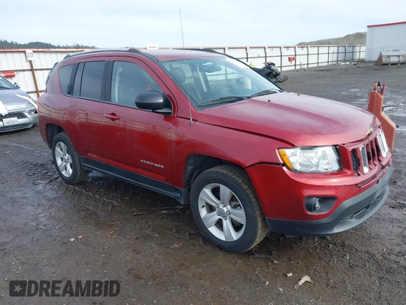 2013 Jeep Compass Sport with VIN 1C4NJDBB2DD207609, listed as a IAAI auction lot 41653746 with 121,697 mi miles. Bid and sale history available at carsss.com. Image 1.