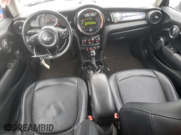 2017 MINI Hardtop Cooper with VIN WMWXP5C55H2D16587, listed as a Copart auction lot 60855195 with 77,769 mi miles and Salvage title. Bid and sale history available at DreamBid. Image 8.