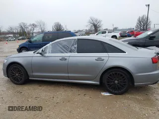 2016 Audi A6 2.0T Premium Plus with VIN WAUGFAFC1GN014536, listed as a IAAI auction lot 41937616 with 122,417 mi miles. Bid and sale history available at carsss.com. Image 14.