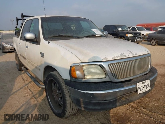 2002 Ford F-150 XLT with VIN 1FTRW07602KB74836, listed as a IAAI auction lot 42069307 with 295,692 mi miles. Bid and sale history available at carsss.com. Image 1.