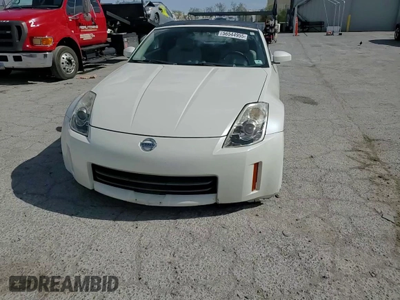 2006 Nissan 350Z Touring z VIN JN1AZ36A56M450937, wystawiony jako Copart lot #56544955 z przebiegiem 102 027 mil mil oraz Szkoda całkowita • Salvage title. Historia ofert i sprzedaży dostępna na DreamBid. Obrazek 13.