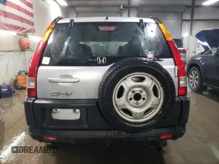 2002 Honda CR-V LX with VIN JHLRD68512C009941, listed as a Copart auction lot 87699075 with 133,311 mi miles and Salvage Title. Bid and sale history available at DreamBid. Image 6.