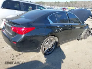2014 Infiniti Q50 Hybrid Premium with VIN JN1AV7APXEM690577, listed as a IAAI auction lot 41493689 with 89,337 mi miles and . Bid and sale history available at DreamBid. Image 4.