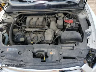 2015 Ford Taurus Limited with VIN 1FAHP2F82FG148180, listed as a Copart auction lot 62354685 with 107,998 mi miles and Salvage title. Bid and sale history available at DreamBid. Image 11.