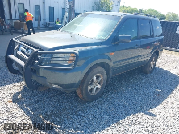 2006 Honda Pilot EX-L with VIN 2HKYF187X6H557468, listed as a IAAI auction lot 42017101 with 213,425 mi miles and . Bid and sale history available at carsss.com. Image 2.