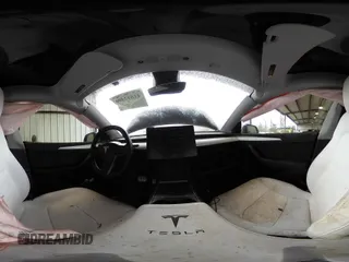 2023 Tesla Model Y Performance with VIN 7SAYGDEF2PF800641, listed as a IAAI auction lot 41612596 with 60,984 mi miles and . Bid and sale history available at DreamBid. Image 20.