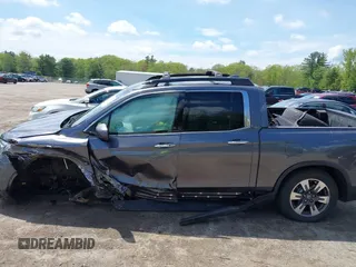 2017 Honda Ridgeline RTL-E with VIN 5FPYK3F77HB003274, listed as a IAAI auction lot 42268854 with 71,049 mi miles and . Bid and sale history available at DreamBid. Image 14.
