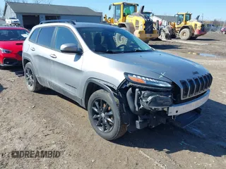 2014 Jeep Cherokee Latitude with VIN 1C4PJMCS7EW310179, listed as a IAAI auction lot 41757831 with 134,087 mi miles and . Bid and sale history available at DreamBid. Image 1.
