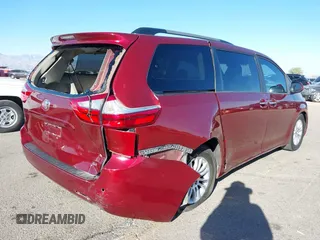 2015 Toyota Sienna XLE with VIN 5TDYK3DCXFS621190, listed as a IAAI auction lot 41646481 with 173,817 mi miles. Bid and sale history available at carsss.com. Image 6.