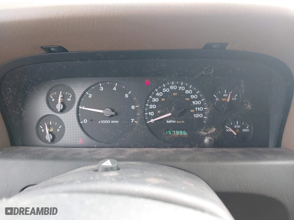 2002 Jeep Grand Cherokee Laredo with VIN 1J4GW48S32C123720, listed as a IAAI auction lot 41909204 with 157,996 mi miles. Bid and sale history available at carsss.com. Image 7.