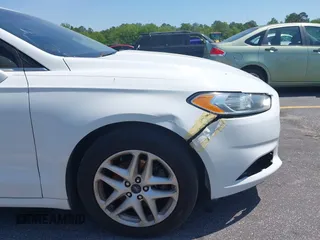 2016 Ford Fusion SE with VIN 3FA6P0H79GR310901, listed as a IAAI auction lot 42079623 with 192,105 mi miles. Bid and sale history available at carsss.com. Image 13.