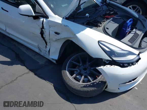 2021 Tesla Model 3 Standard Range Plus z VIN 5YJ3E1EA8MF100456, wystawiony jako IAAI lot #42100840 z przebiegiem 64 389 mil mil oraz . Historia ofert i sprzedaży dostępna na DreamBid. Obrazek 6.