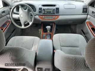 2004 Toyota Camry LE z VIN 4T1BE30K04U301360, wystawiony jako Copart lot #60804115 z przebiegiem 287 009 mil mil oraz Szkoda całkowita • Salvage title. Historia ofert i sprzedaży dostępna na DreamBid. Obrazek 8.