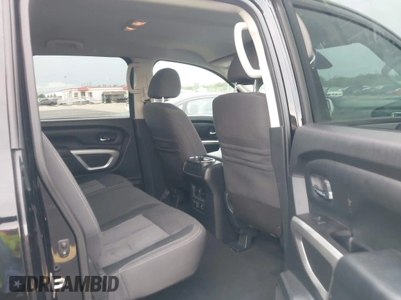 2021 Nissan Titan SV with VIN 1N6AA1EF4MN503458, listed as a IAAI auction lot 42401074 with 53,558 mi miles and . Bid and sale history available at DreamBid. Image 8.