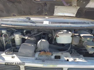 1989 GMC Vandura z VIN 1GDEG25K1K7521984, wystawiony jako IAAI lot #41371811 z przebiegiem 43 502 mil mil oraz . Historia ofert i sprzedaży dostępna na DreamBid. Obrazek 10.