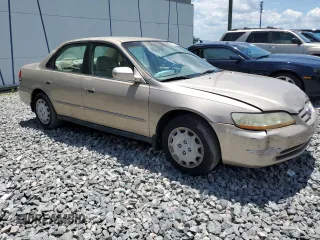 2002 Honda Accord LX z VIN 1HGCG56442A003742, wystawiony jako Copart lot #56949065 z przebiegiem 158 722 mil mil oraz Nie do naprawy • Non repairable. Historia ofert i sprzedaży dostępna na DreamBid. Obrazek 4.