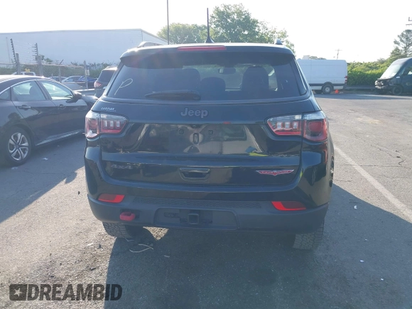 2019 Jeep Compass Trailhawk with VIN 3C4NJDDB5KT800515, listed as a IAAI auction lot 42059594 with 60,338 mi miles and . Bid and sale history available at DreamBid. Image 16.