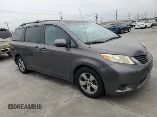 2012 Toyota Sienna LE AAS with VIN 5TDKK3DC0CS242667, listed as a Copart auction lot 65041005 with 196,322 mi miles and Clean title. Bid and sale history available at DreamBid. Image 4.