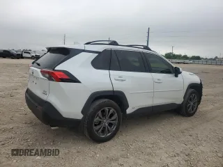 2024 Toyota RAV4 Hybrid XLE Premium with VIN JTMB6RFV6RJ054408, listed as a Copart auction lot 52120745 with 2,961 mi miles and Salvage Title. Bid and sale history available at DreamBid. Image 3.