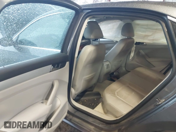 2012 Volkswagen Passat SE with VIN 1VWBH7A38CC053564, listed as a IAAI auction lot 41488237 with 188,636 mi miles and . Bid and sale history available at DreamBid. Image 8.