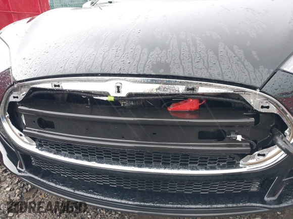2014 Tesla Model S 60 with VIN 5YJSA1H18EFP28053, listed as a IAAI auction lot 41191521 with 82,207 mi miles and . Bid and sale history available at DreamBid. Image 6.