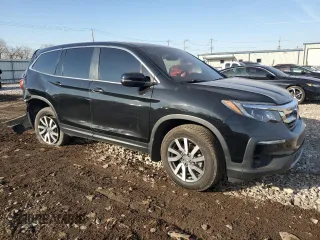 2021 Honda Pilot EX-L with VIN 5FNYF6H52MB088948, listed as a Copart auction lot 48586245 with 79,186 mi miles and Salvage Title. Bid and sale history available at carsss.com. Image 4.