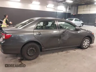 2011 Toyota Corolla L with VIN JTDBU4EE3BJ102060, listed as a IAAI auction lot 42140081 with 125,989 mi miles. Bid and sale history available at carsss.com. Image 6.