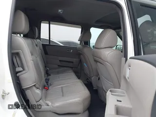 2014 Honda Pilot EX-L with VIN 5FNYF3H73EB024368, listed as a IAAI auction lot 41646002 with 157,336 mi miles and . Bid and sale history available at carsss.com. Image 8.